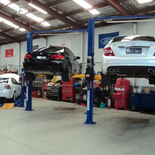 Vehicle Lift for Underbody Inspection in Progress