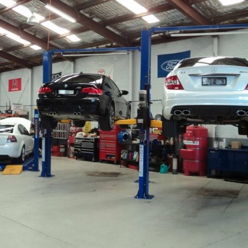 Vehicle Lift for Under body Inspection in Progress